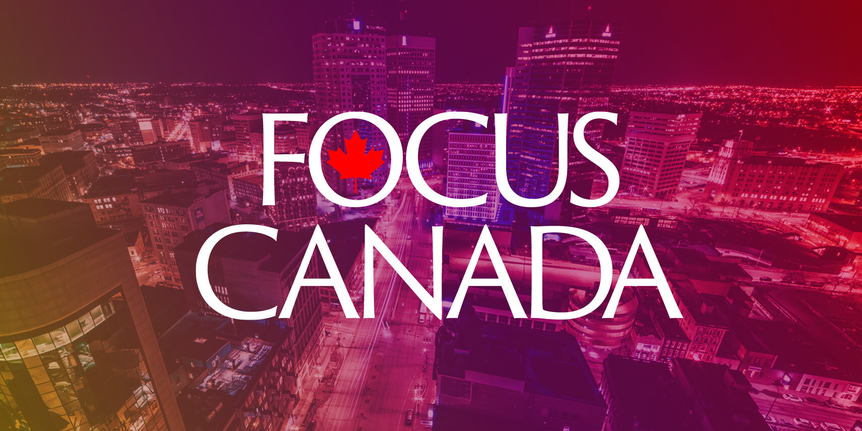 A vibrant cityscape at night with bright lights and tall buildings, overlaid with the bold white text 