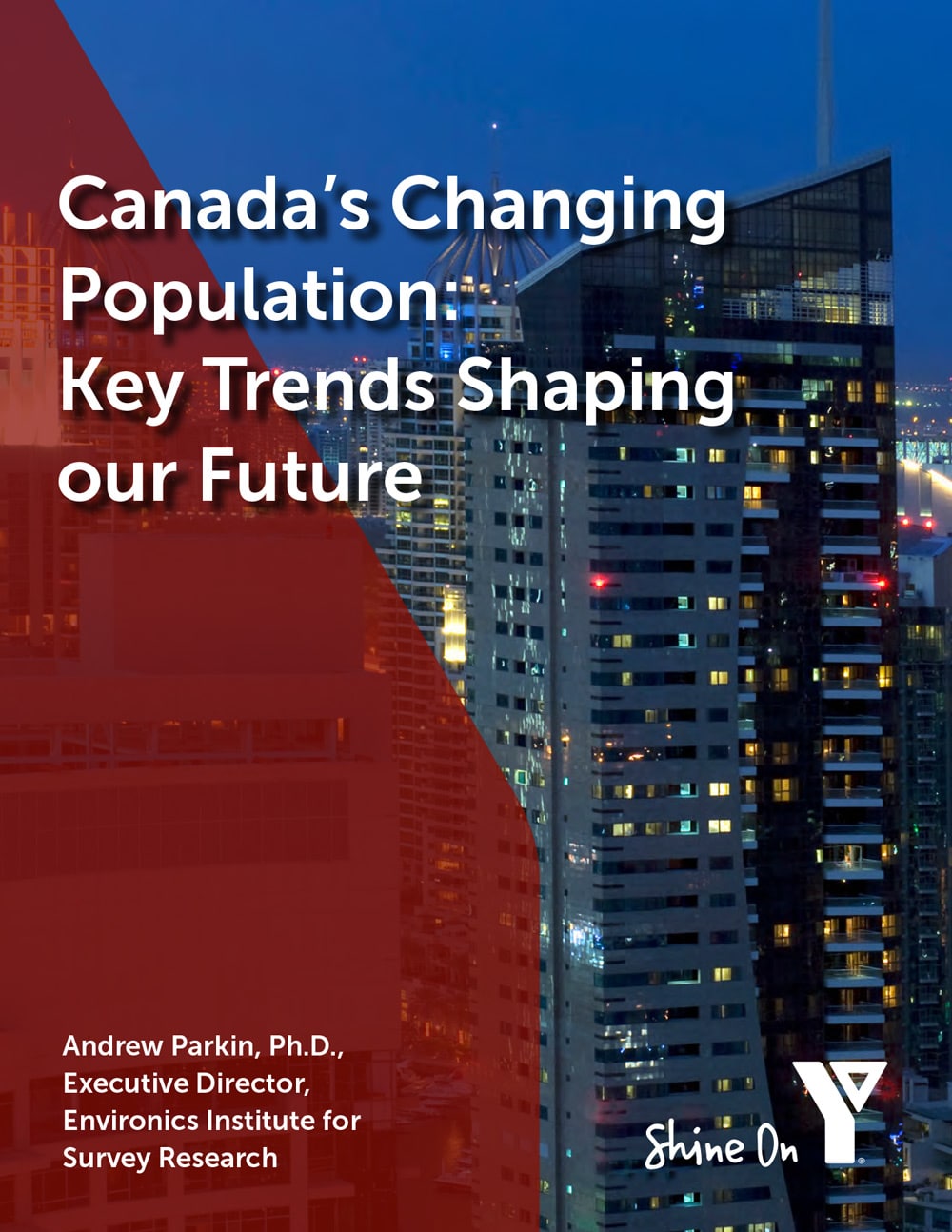A cityscape at dusk with tall, brightly lit buildings. Overlaid text highlights Canada&rsquo;s Changing Population: Key Trends Shaping our Future by Andrew Parkin, Ph.D., alongside Environics Institute and YWCA logos.