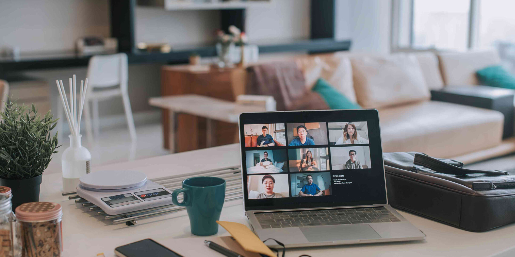 A laptop on a table, ready for working from home.